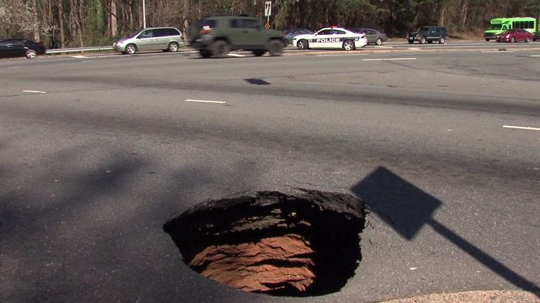 Sinkhole on Hanes Mall Boulevard at Silas Creek Parkway. (David Weatherly/WGHP)