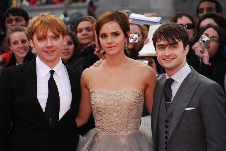 Rupert Grint, Emma Watson and Daniel Radcliffe attend the World Premiere of Harry Potter and The Deathly Hallows - Part 2 at Trafalgar Square on July 7, 2011, in London, England. (Photo by Ian Gavan/Getty Images)