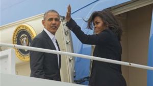 President Barack Obama first lady Michelle Obama board Air Force One, Sunday, March 20, 2016, at Andrews Air Force Base, Md. Obama and his family are traveling to Cuba, the first U.S. president to visit the island in nearly 90 years. (AP Photo/Pablo Martinez Monsivais)