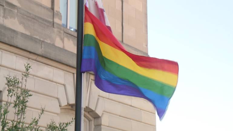 Rainbow flag outside Des Moines' City Hall.