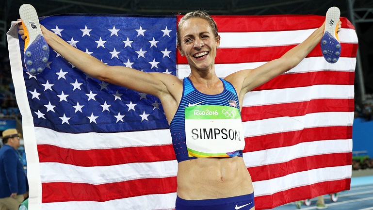 RIO DE JANEIRO, BRAZIL - AUGUST 16: Jennifer Simpson of the United States celebrates with the American flag after winning the bronze medal in the Women's 1500m Final on Day 11 of the Rio 2016 Olympic Games at the Olympic Stadium on August 16, 2016 in Rio de Janeiro, Brazil. (Photo by Ian Walton/Getty Images)