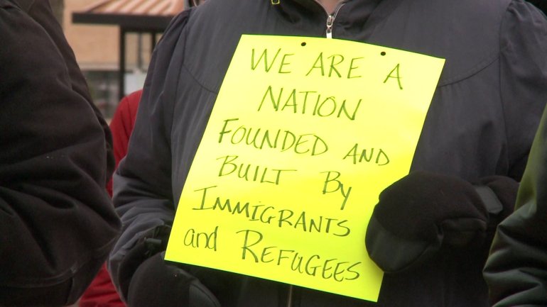 A group gathered in Dubuque on Saturday to protest the immigrant ban. (WHO-HD)