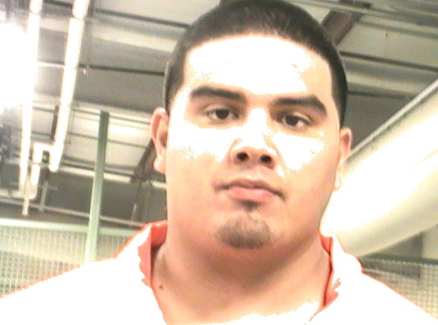 Erik Nunez's booking photo 12/15/2014.