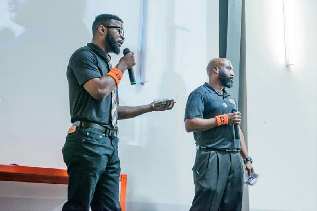 Jerome Morgan and Daniel Rideau pitch their idea for RAE Grooming Barbership, a barbering and grooming apprenticeship program that keeps youth out of the juvenile justice system. They tied for first place at a recent PitchNOLA competition. Photo by Robert Warren)