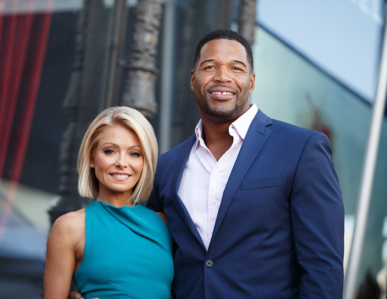 Disney and ABC executives apologize to television host Kelly Ripa for keeping her in the dark about her co-host Michael Strahan's exit. (Photo by Mark Davis/Getty Images)