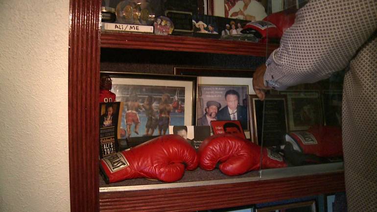 Autographed Ali gloves in Glen Singleton's home