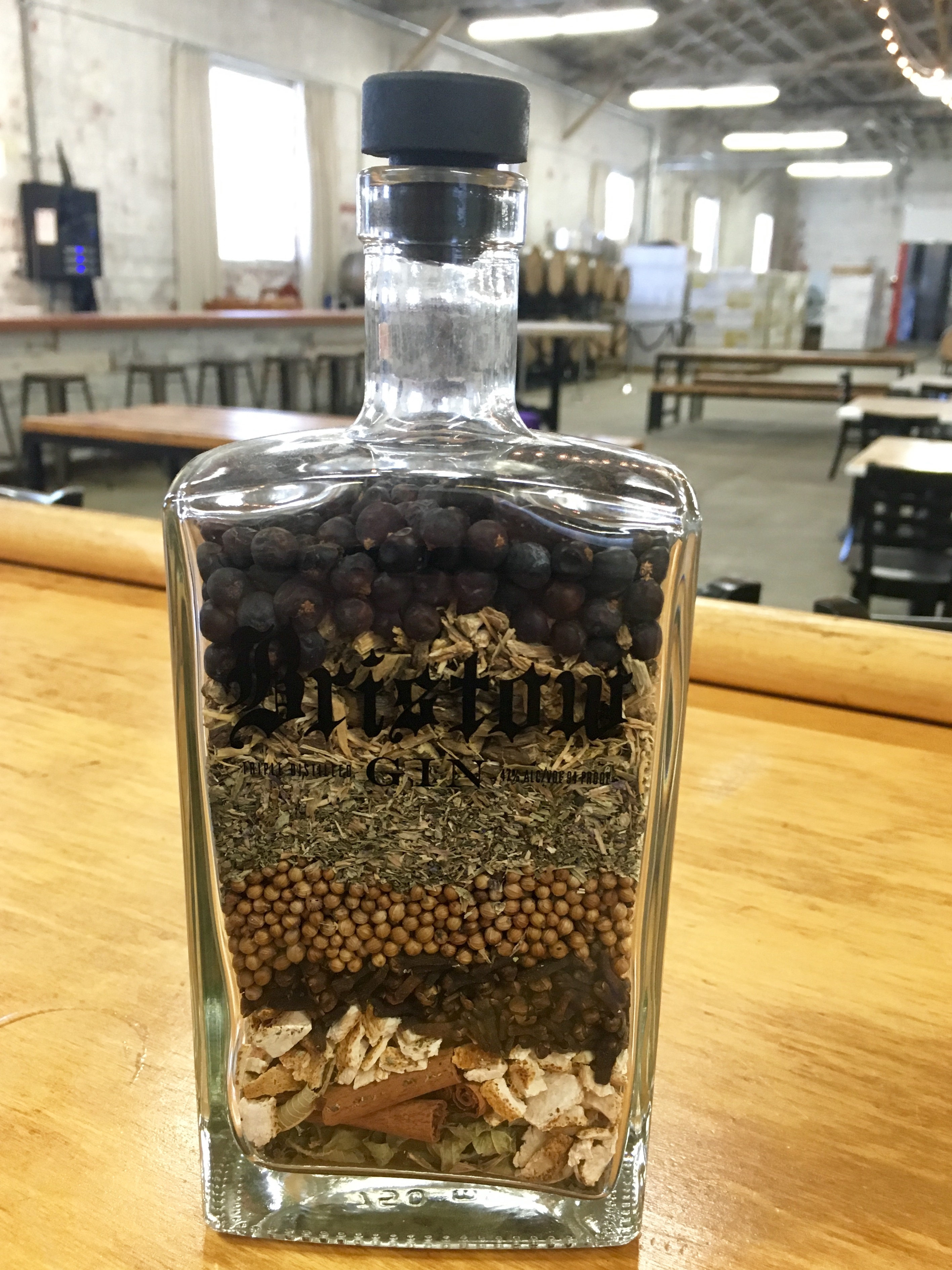 An empty gin bottle was filled with the spices used to make the spirit.