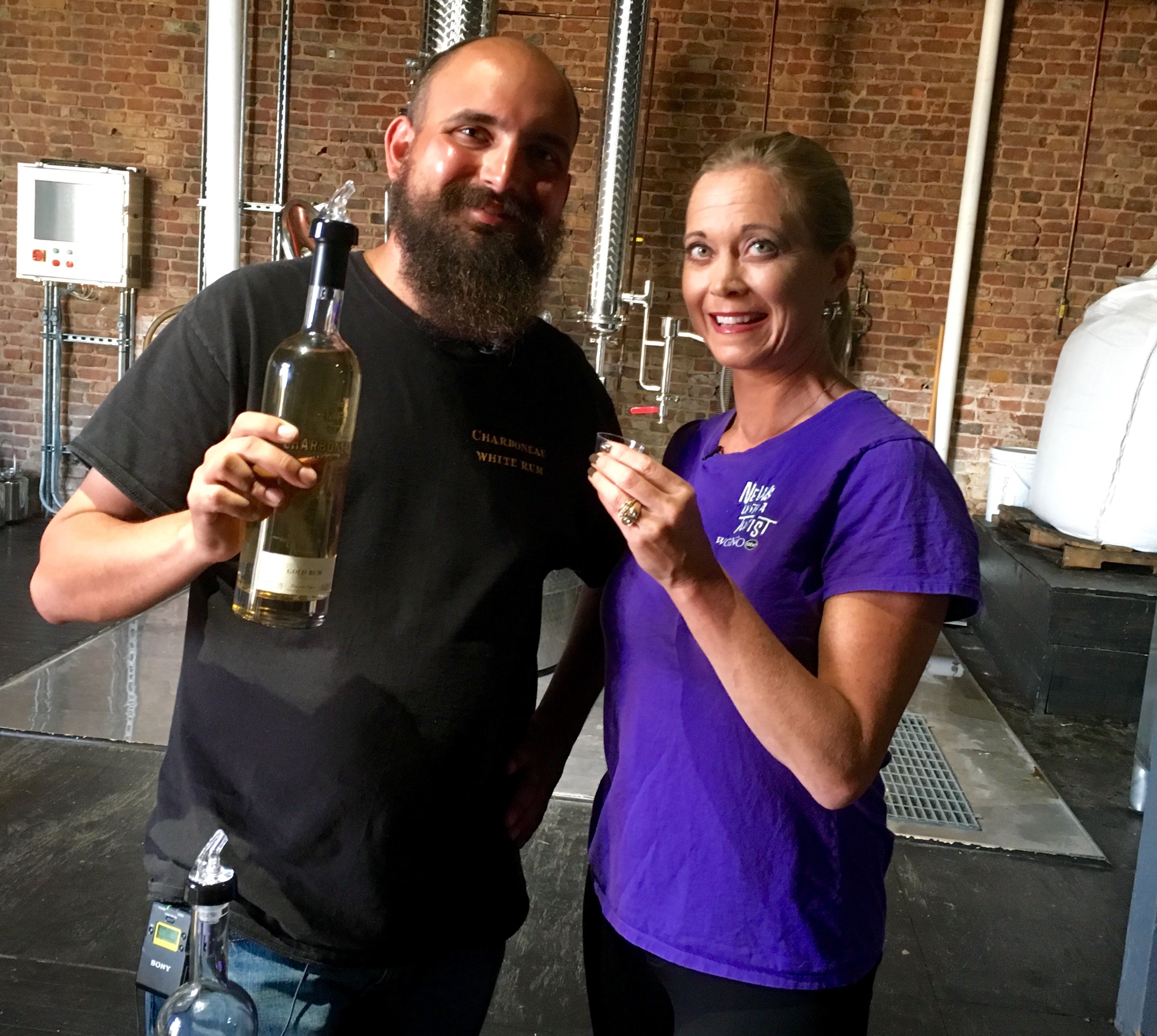 Owner and Distiller Jean-Luc Charboneau with News with a Twist's Travel Girl, Stephanie Oswald.