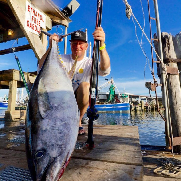 Brandon Hendrickson with a 79lb Yellowfin Tuna