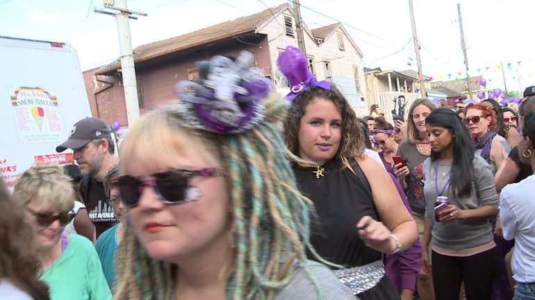 Second Line Parade revelers in New Orleans (WGNO-TV)