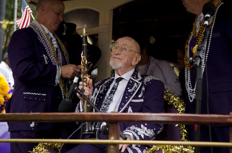 Pete Fountain and his group Pete Fountain's Half Fast Walking Club make their way along St. Charles Avenue during the Mardi Gras parade on Fat Tuesday in New Orleans, LA, March 8, 2011.   Mardi Gras, or Fat Tuesday, is the final day of Carnival, and the day before Ash Wednesday, the first day of Lent. It's been celebrated in Louisiana since the late 17th century when it was under French colonial rule. AFP PHOTO /  ROD LAMKEY JR (Photo credit should read ROD LAMKEY JR/AFP/Getty Images)