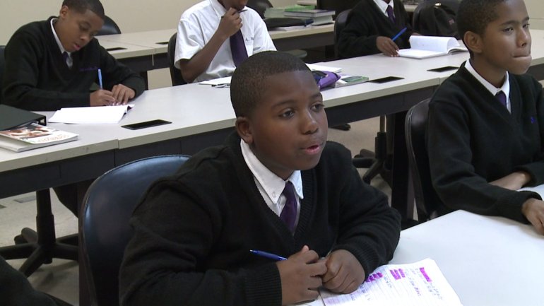 Students in class at St. Augustine High School (WGNO-TV)