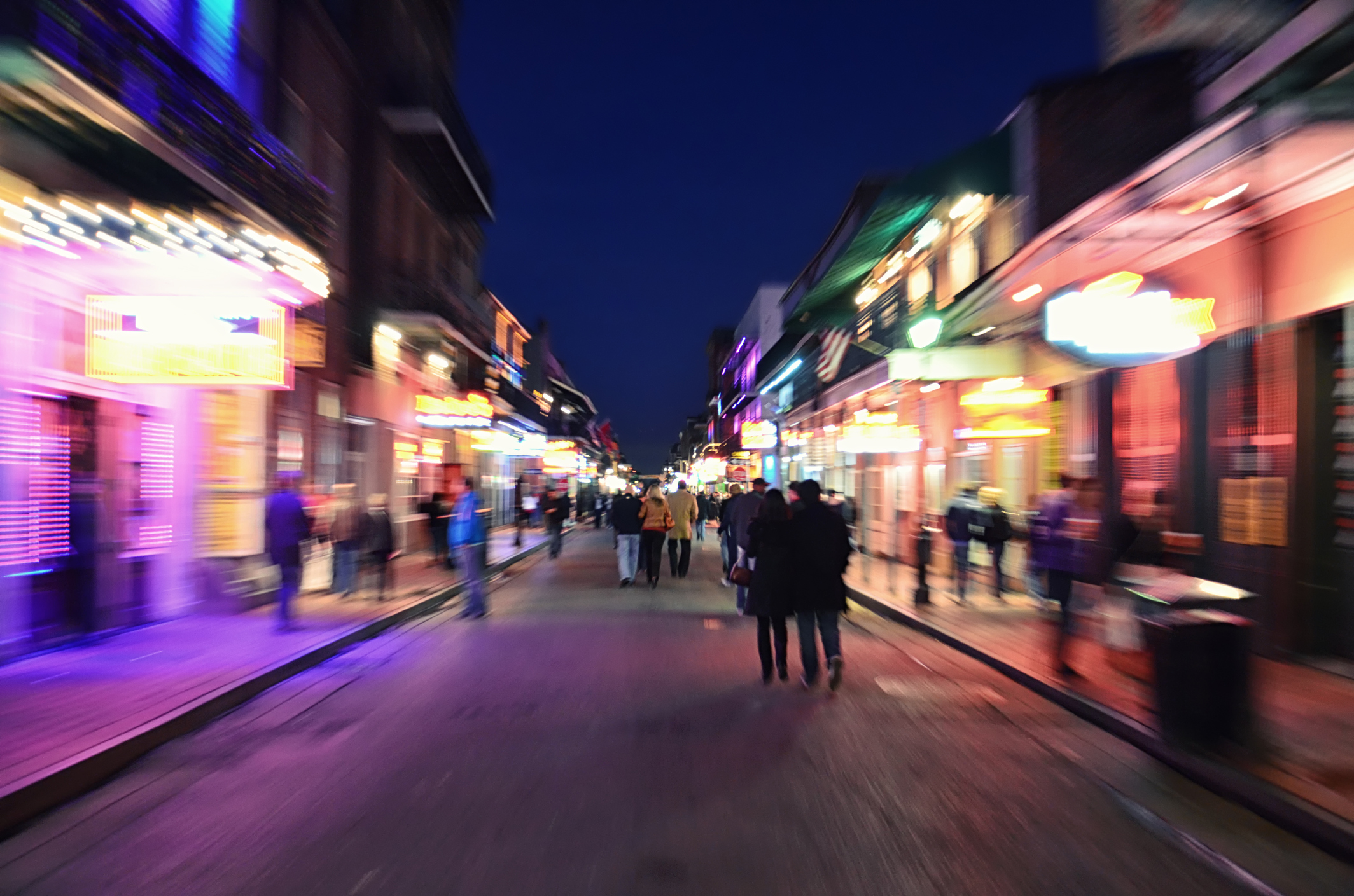 "Moving sense on Bourbon Street, a feeling of the nightlife in New Orleans famous French Quarter."