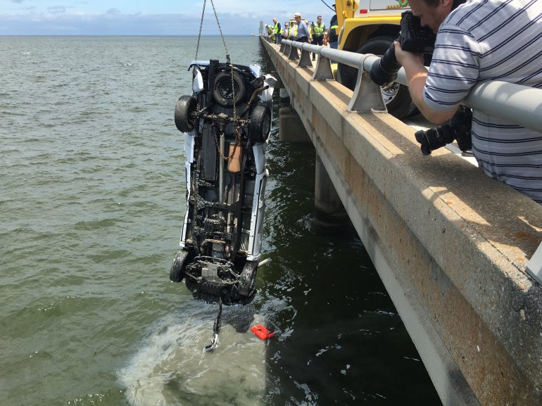 Pick-up truck pulled from Lake Pontchartrain Monday, August 8, after morning accident sent it overboard. (WGNO/ Derek Felton)