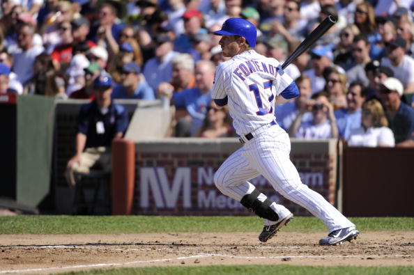 CHICAGO - MAY 29: Mike Fontenot #17 of the Chicago Cubs hits his second triple of the game against the St. Louis Cardinals on May 29, 2010 at Wrigley Field in Chicago, Illinois. The Cubs defeated the Cardinals 5-0. (Photo by Ron Vesely/MLB Photos via Getty Images)