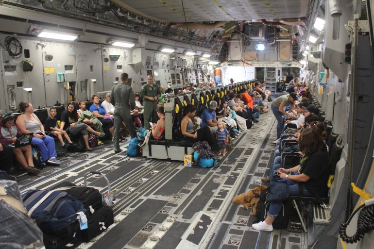 The U.S. Navy is releasing two photos taken TODAY (Oct. 2) as part of the evacuation of approximately 700 spouses and children from Naval Station Guantanamo Bay, Cuba during preparations for the arrival of Hurricane Matthew.