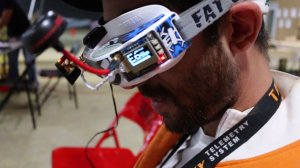 Pilots fly while wearing goggles that only provide a view from their drone's camera