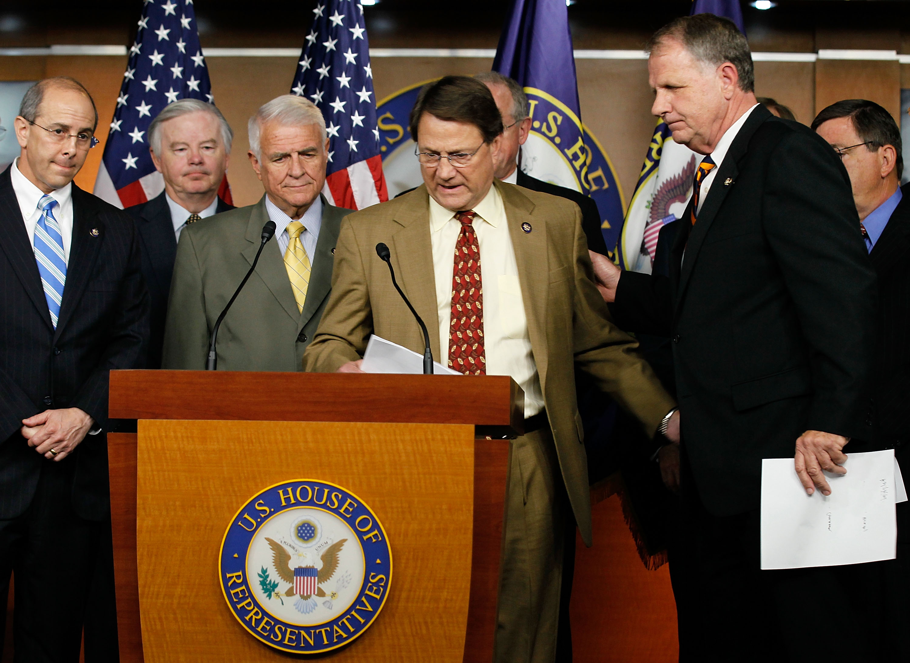 WASHINGTON - JUNE 15: U.S. Rep. Charlie Melancon (D-LA) (4th L) takes the podium as (L-R) Rep. Charles Boustany (R-LA), Rep. Joe Barton (R-TX), Rep. John Carter (R-TX), and Rep. Ted Poe (R-TX) look on during a news conference June 15, 2010 on Capitol Hill in Washington, DC. Members of the Gulf Coast Congressional delegation called on the Obama Administration for an end to the moratorium on new deepwater drilling. (Photo by Alex Wong/Getty Images)