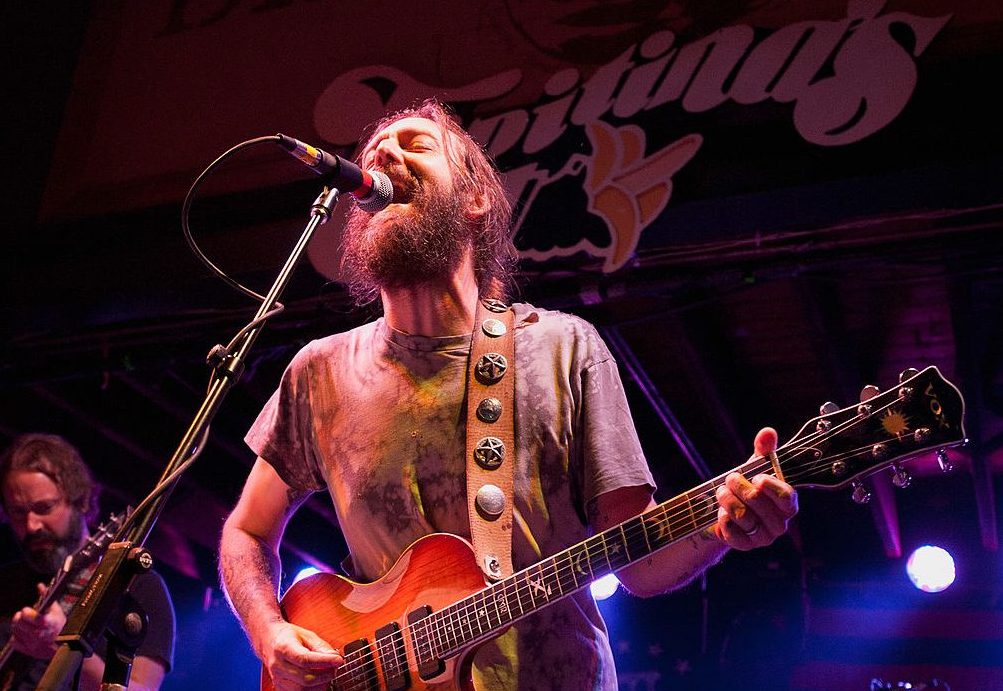 NEW ORLEANS, LA - MAY 03: (L-R): Neal Casal, Chris Robinson and George Sluppick of Chris Robinson Brotherhood perform at Tipitina's on May 3, 2012 in New Orleans, Louisiana. (Photo by Erika Goldring/Getty Images)