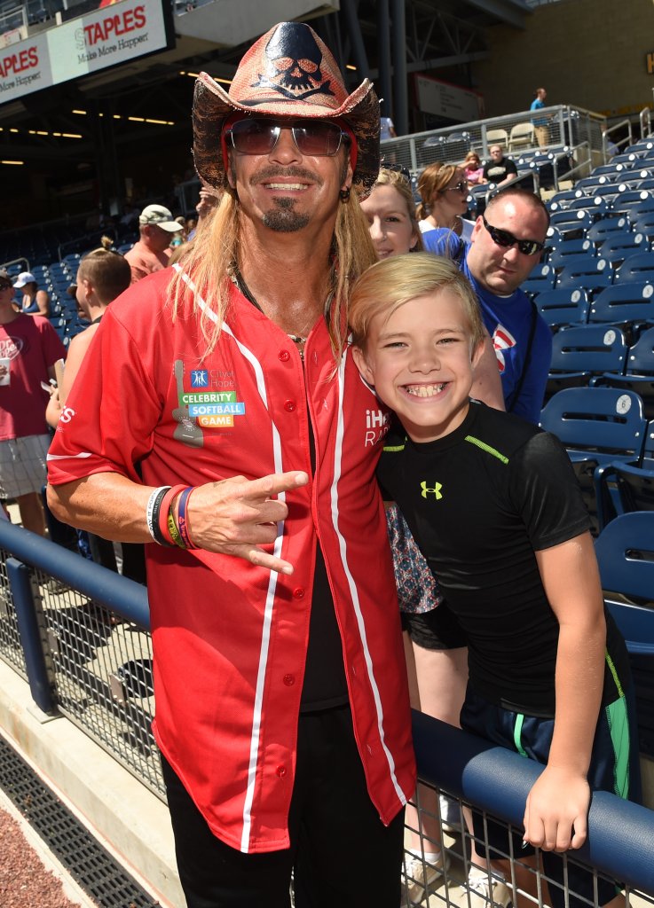 NASHVILLE, TN - JUNE 07: Singer-songwriter Bret Michaels poses with fan during the 26th Annual City of Hope Celebrity Softball Game at First Tennessee Park on June 7, 2016 in Nashville, Tennessee. (Photo by Rick Diamond/Getty Images for City Of Hope)
