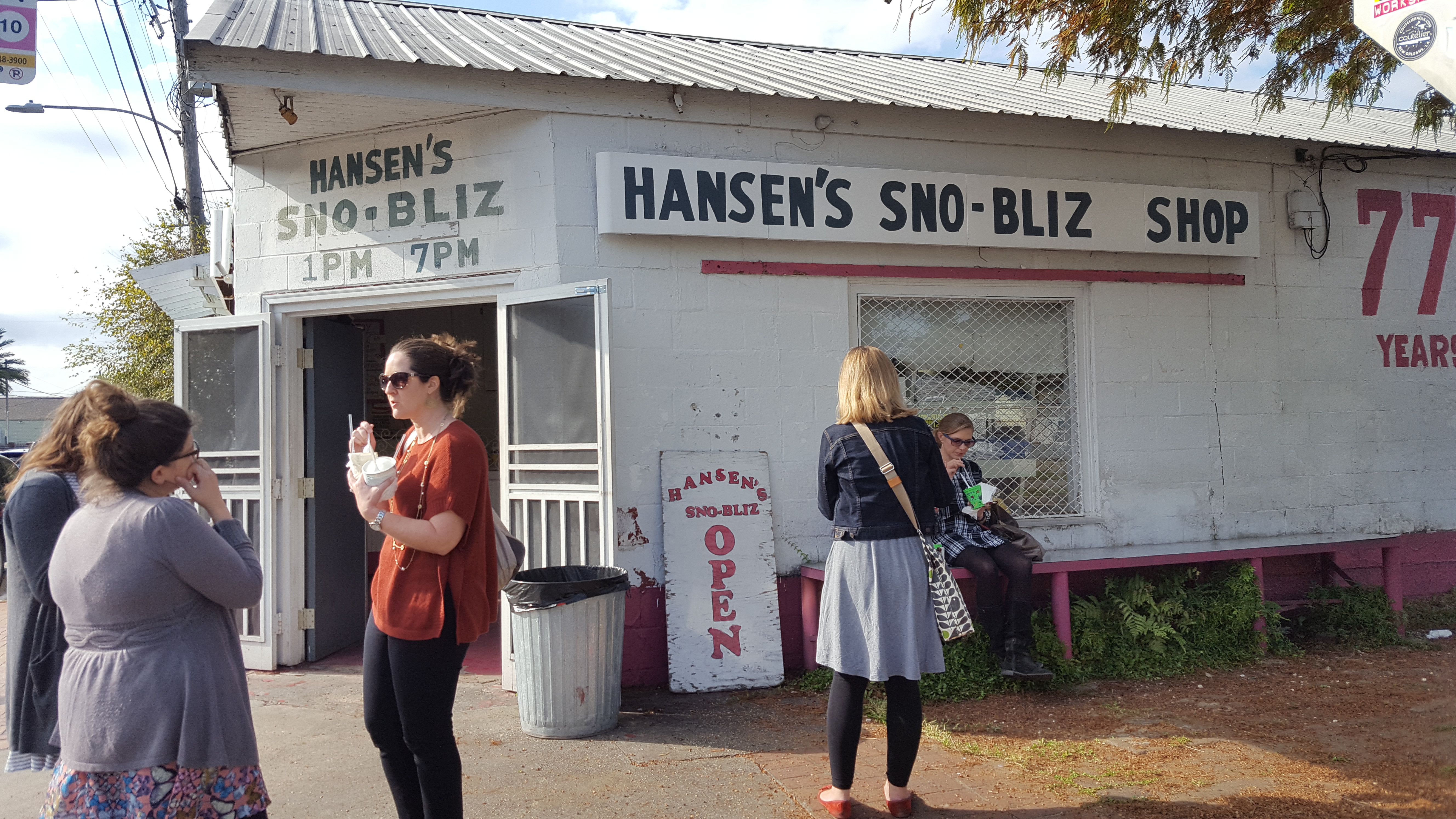 Patrons enjoy "winter" hours at Hansen's Sno-Bliz Friday afternoon. 