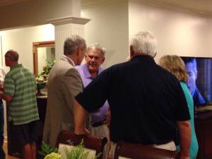 Superintendent Casey Wardynski stops by Walker McGinnis' home to congratulate him on his District 4 win.