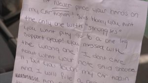 Photo of the letter __ Brady found on her car.