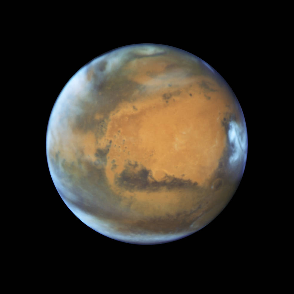 Hubble Space Telescope photo of Mars taken when the planet was 50 million miles from Earth on May 12, 2016. Credits: NASA, ESA, the Hubble Heritage Team (STScI/AURA), J. Bell (ASU), and M. Wolff (Space Science Institute)