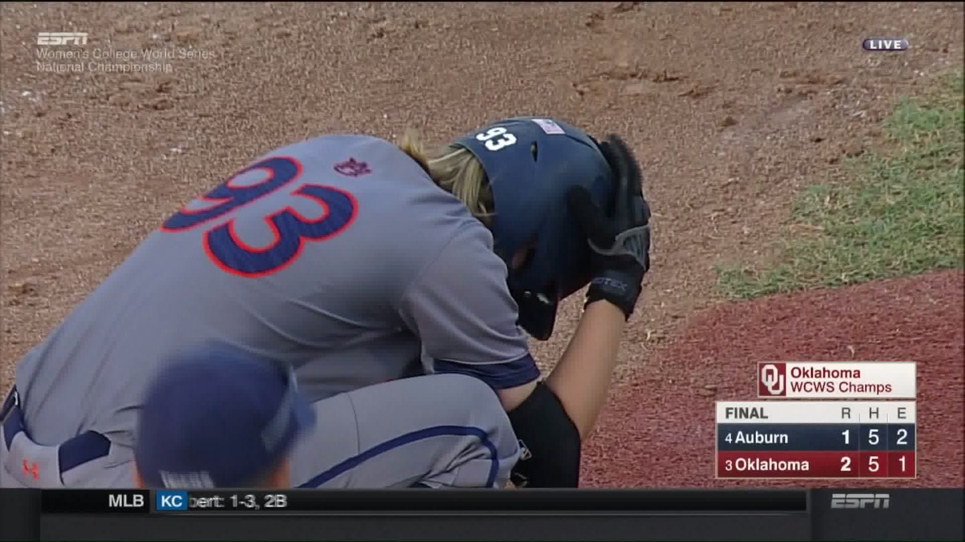Auburn softball player Courtney Shea reacts to the team's loss of Game 3