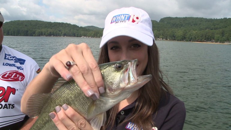 Taylor Tannebaum holds the fish she caught. (Gregg Stone/WHNT News 19)