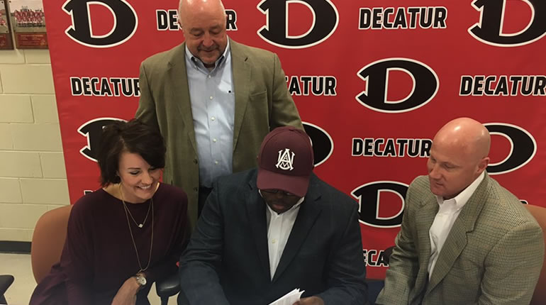 Decatur's Cedric Pointer signs with Alabama A&M University. (Photo: Taylor Tannebaum)
