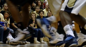Donna Dye watches from the front row as Decatur Central takes on Mount Vernon.