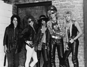 LOS ANGELES - JUNE 1985: (L-R) Izzy Stradlin, Axl Rose, Slash, Duff McKagan and Steven Adler of the rock group 'Guns n' Roses' pose for a portrait in the alley behind Canter's Deli in June 1985 in Los Angeles, California. They had just returned home from "Hell Tour" in Seattle. (Photo by Jack Lue/Michael Ochs Archives/Getty Images)