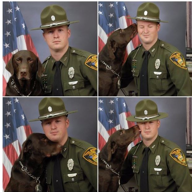 DNR officer Levi Knach and K-9 Kenobi pose, kind of, for a series of portraits. (Courtesy Photo | Indiana DNR)