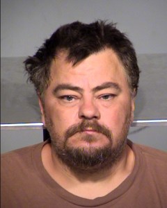 George Key, 38, was arrested on preliminary charges of burglary and criminal recklessness with a weapon.