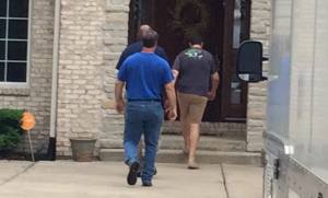 Jared Fogle walking into home. Photo credit: WXIN