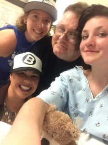 Photo taken of Autumn Veatch recovering in hospital with her dad and friends. Credit:David Veatch/KCPQ