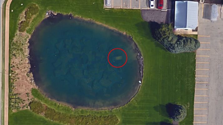 The red circle highlights the area where the car was located in the pond. | Source: Google Maps