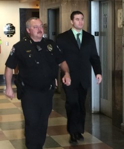 Holtzclaw entering the courtroom