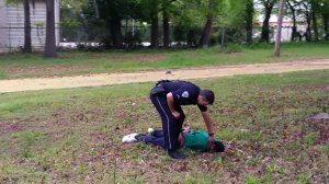 This still, released by the family of Walter Scott, appears to show North Charleston, South Carolina police officer Michael Slager shooting Scott in the back as he ran away from the officer. The incident took place Saturday, April 4, 2015.