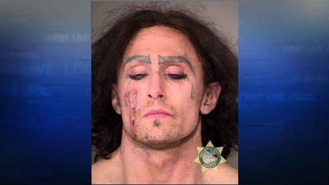 Police: Man arrested after damaging vehicles, licking man on the face