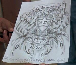 A sketch created by Logan County jail inmates in memoriam of Deputy David Wade, who was shot and killed Tuesday, April 18, 2017, given to Logan County Sheriff Damon Devereaux. (KFOR/Kevin Josefy)
