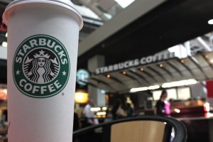 File photo of a Starbucks location and beverage. (Credit: Ferre' Dollar/CNN)