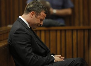 Oscar Pistorius reacts in the Pretoria High Court on Sept. 11, 2014, in Pretoria, South Africa. (Credit: Kim Ludbrook/Pool/EPA/Gallo Image/Getty Images)