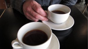 Two cups of coffee sit on a table in a Sydney, Australia coffee shop. (Credit: Daisy Dumas/CNNGo)