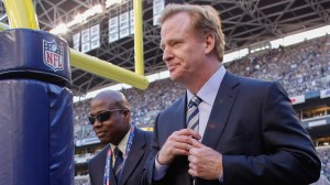 NFL commissioner Roger Goodell (R) walks the sidelines prior to the game between the Seattle Seahawks and the Green Bay Packers at CenturyLink Field on Sept. 4, 2014, in Seattle, Washington. (Credit: Otto Greule Jr/Getty Images)