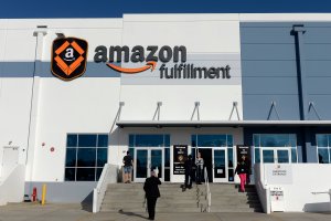 Employees arrive at Amazon's San Bernardino Fulfillment Center October 29, 2013. (Credit: Kevork Djansezian/Getty Images)