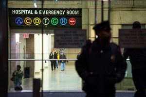 A New York City Police officer stands at the entrance to Bellevue Hospital Oct. 23, 2014, in New York City. After returning to New York City from Guinea where he was working with Doctors Without Borders treating Ebola patients, Dr. Craig Spencer was quarantined after showing symptoms consistent with the virus. Spencer was taken to Bellevue hospital to undergo testing. (Credit: Bryan Thomas/Getty Images)