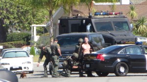 A neighbor of Jason "Mayhem" Miller shared this photo of his arrest after a standoff that he live-tweeted on Oct. 9, 2014, in Mission Viejo. 