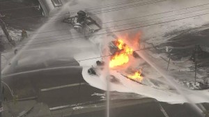 A tanker truck was burning in Boyle Heights on Oct. 31, 2014. (Credit: KTLA)